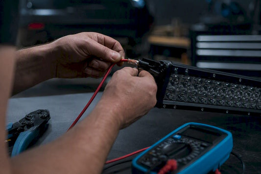 Hands wiring LED light bar with 12 AWG wire