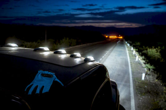 LED cab lights illuminating a dark highway